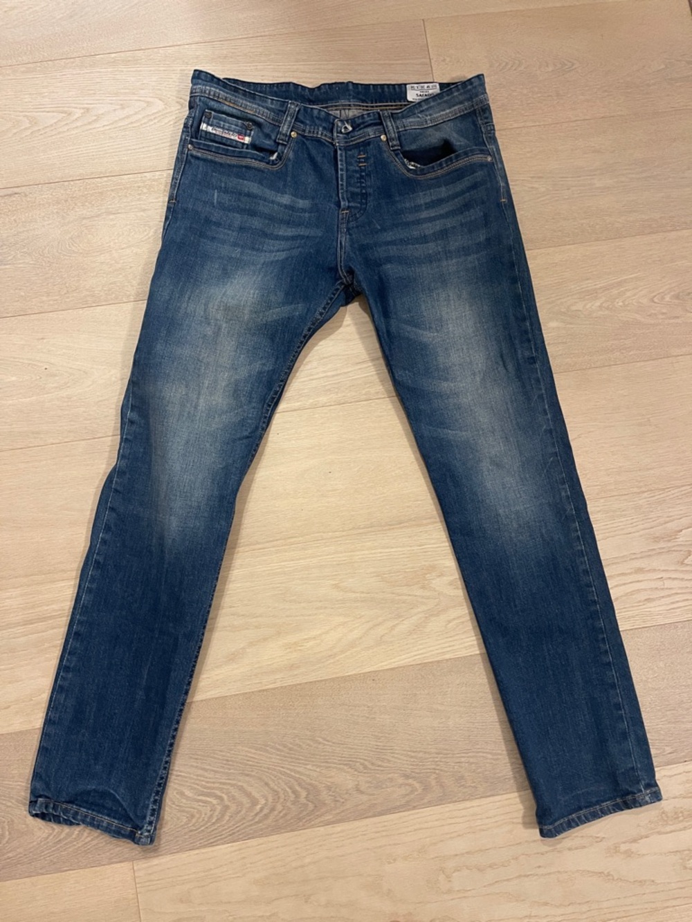 Diesel Slim Fit Jeans in Distressed Blue Wash